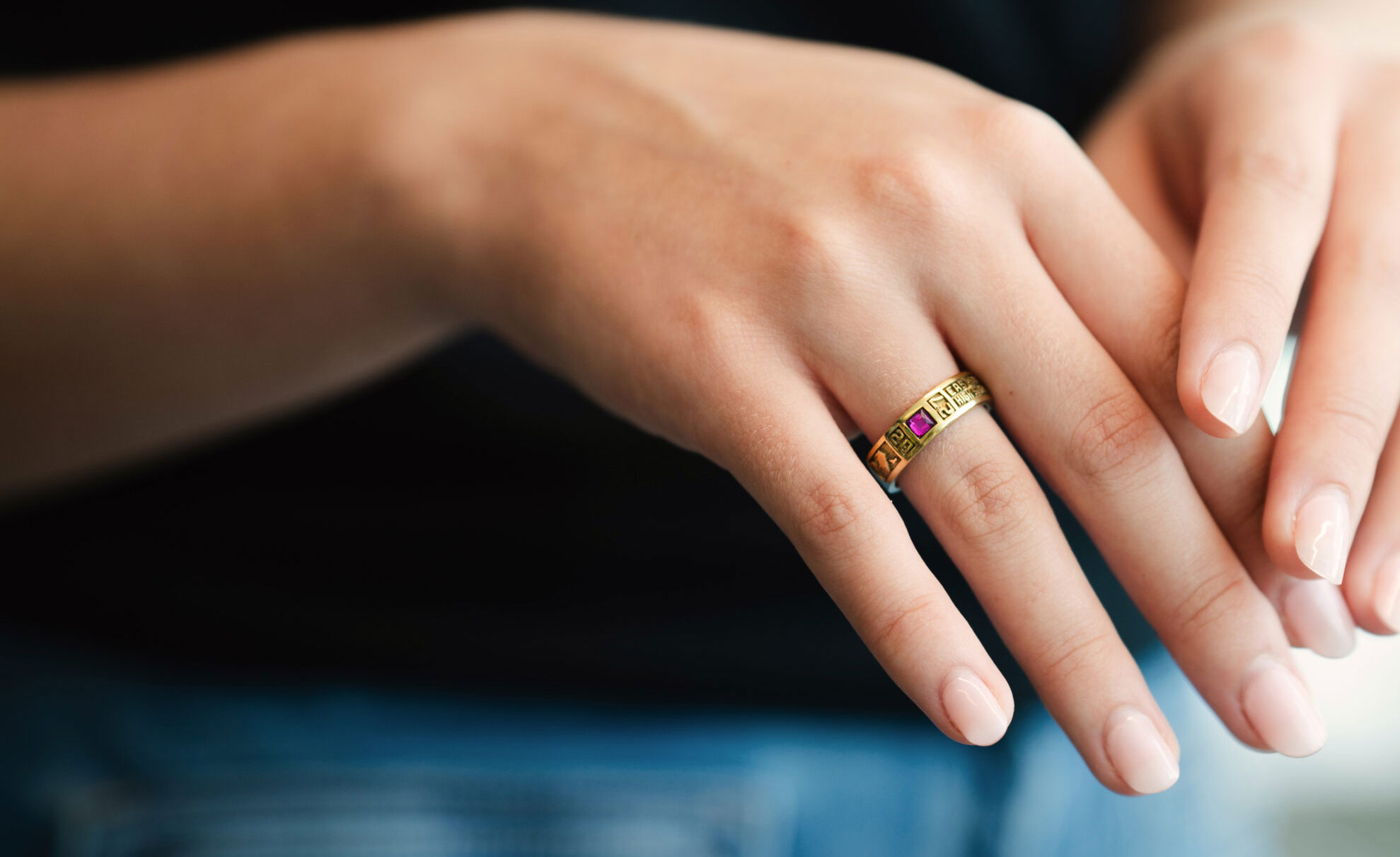 Class ring on hand